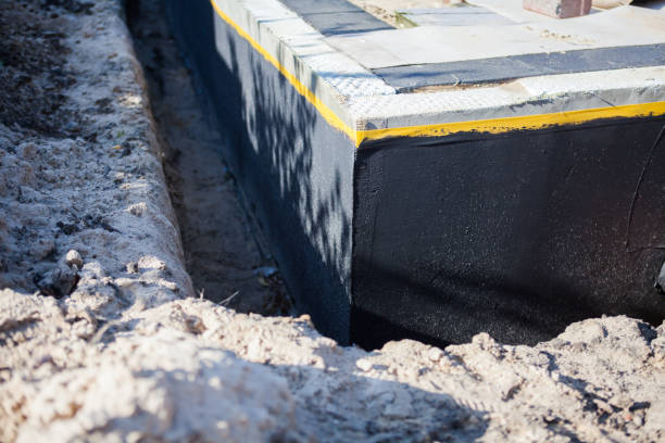 Professional Emergency Waterproofing technician working in Wyoming, MN